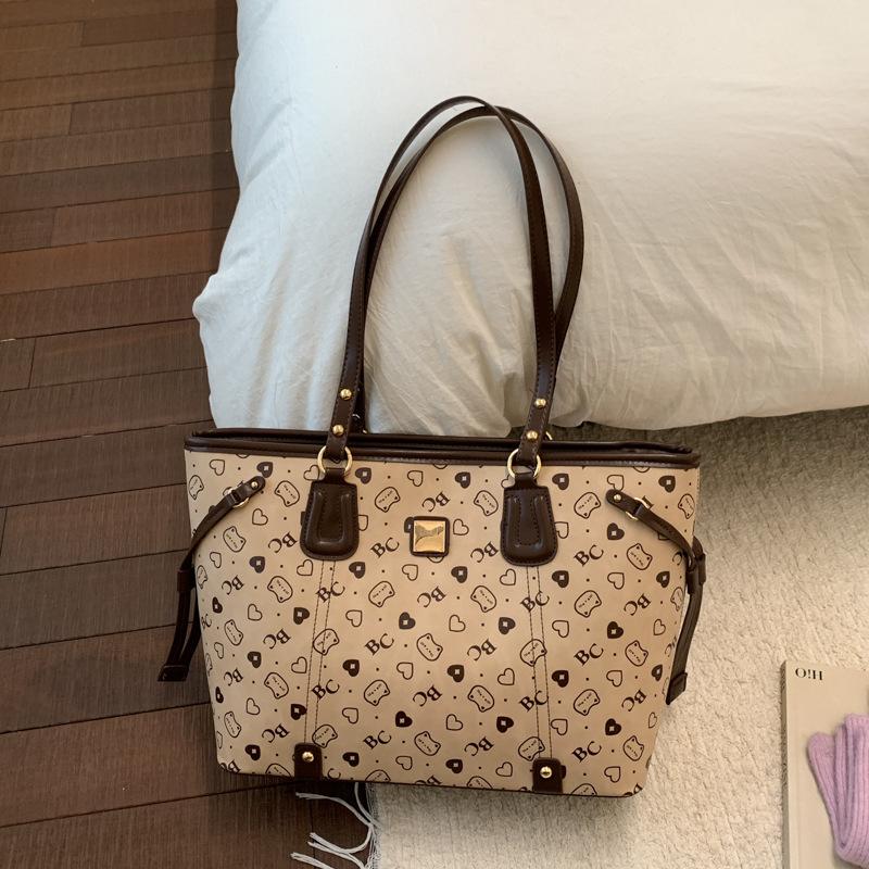 

Korean version of the new cute cartoon print foreign style leisure student class shoulder hand-held 2025 autumn and winter tote bag 40*12*26