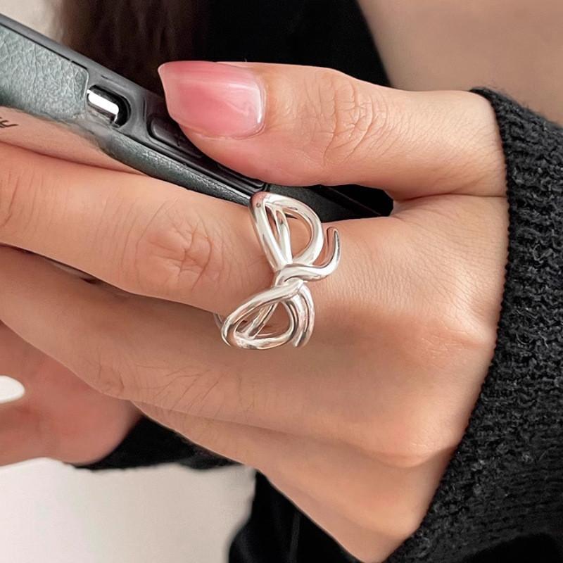 Elegant Open Adjustable Copper Bowknot Ring For Women With Unique Geometric Design