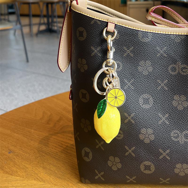 2025 Portachiavi Limone Dorato Ciondolo Borsa Portachiavi alla Moda Personalizzato Ciondolo Borsa Portachiavi Accessori Catena Borsa
