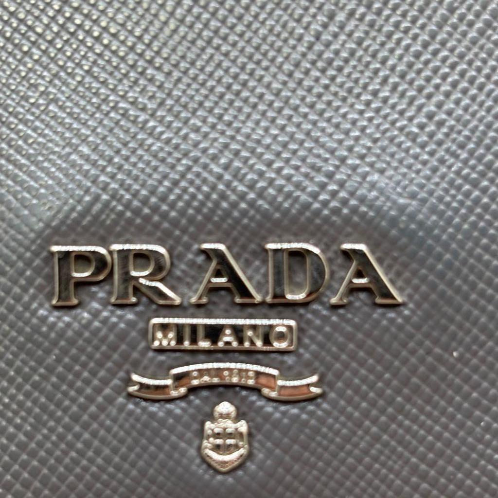 Used Beautiful condition  PRADA Saffiano long wallet, gray, bifold wallet, silver logo