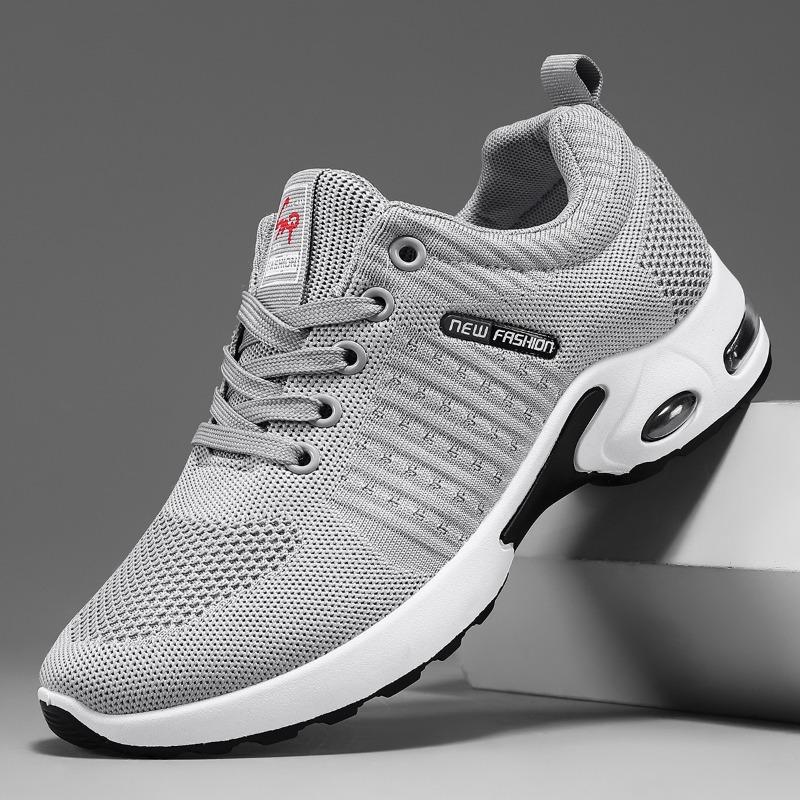 Buty Nowe męskie buty Latająca dzianina poduszka powietrzna buty na miękkiej podeszwie Trend modowy Oddychające codzienne sportowe buty męskie