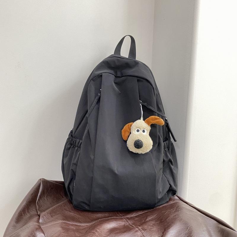 Travel lightweight advanced sense niche backpack college student commuter junior high school girls schoolbag Japanese and Korean simple backpack