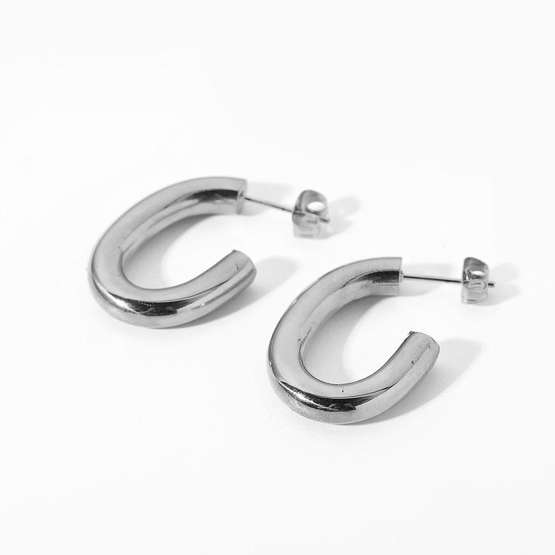 

CARLIDANA Trendy Jewelry Earrings Waterproof Hypoallergenic C-shaped 18K Gold Plated Stainless Steel Hoop Earrings for Women срібний