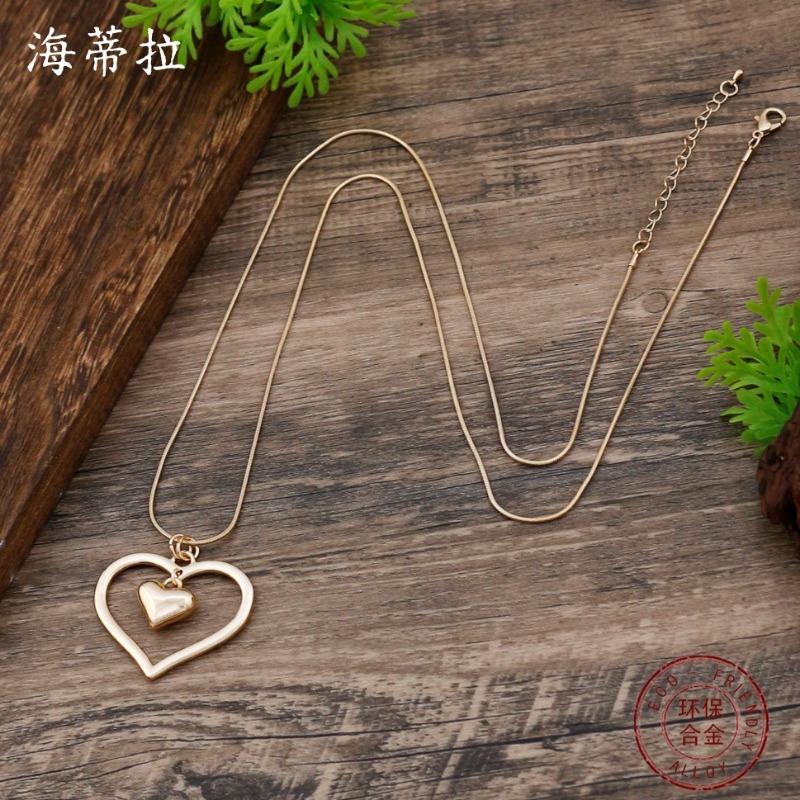 New Glossy Hollow Love Snake Bone Chain Long Pendant Women's Simple and Advanced Autumn and Winter Heart-shaped Long Necklace