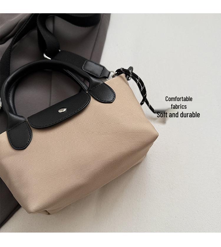 Minimalist Color-Block Oxford Cloth Handbag: Versatile, Fashionable Shoulder Bag with Unique Texture.