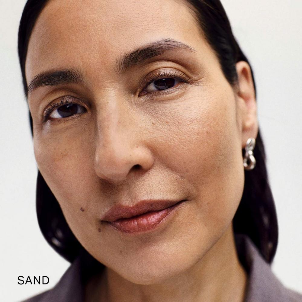 Merit Der Minimalist Perfektionierender Teint Foundation Concealer Stick 0,23 oz Sand