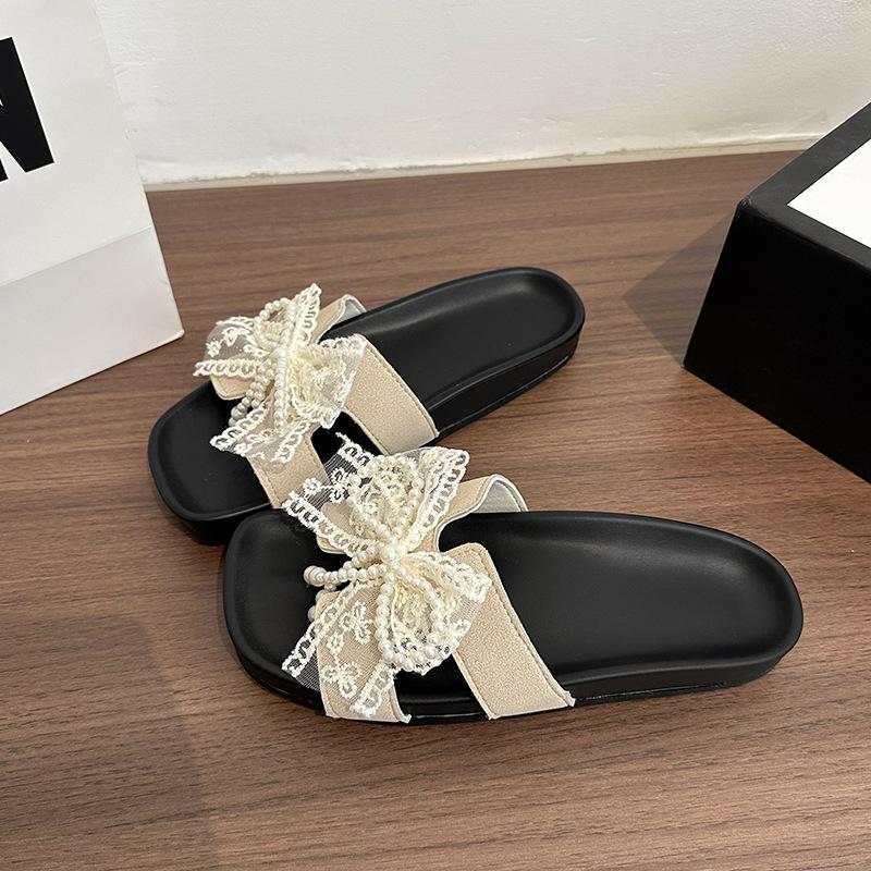 

Сладкий кружевной бант одно слово женские летние шлепанцы на плоской подошве прохладные тапочки легкие и удобные для улицы повседневные прохладные шлепанцы 40 бежевый