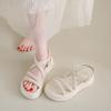 Sandals female 2025 summer new fairy wind round head cross belt casual muffin platform fashion beach roman shoes