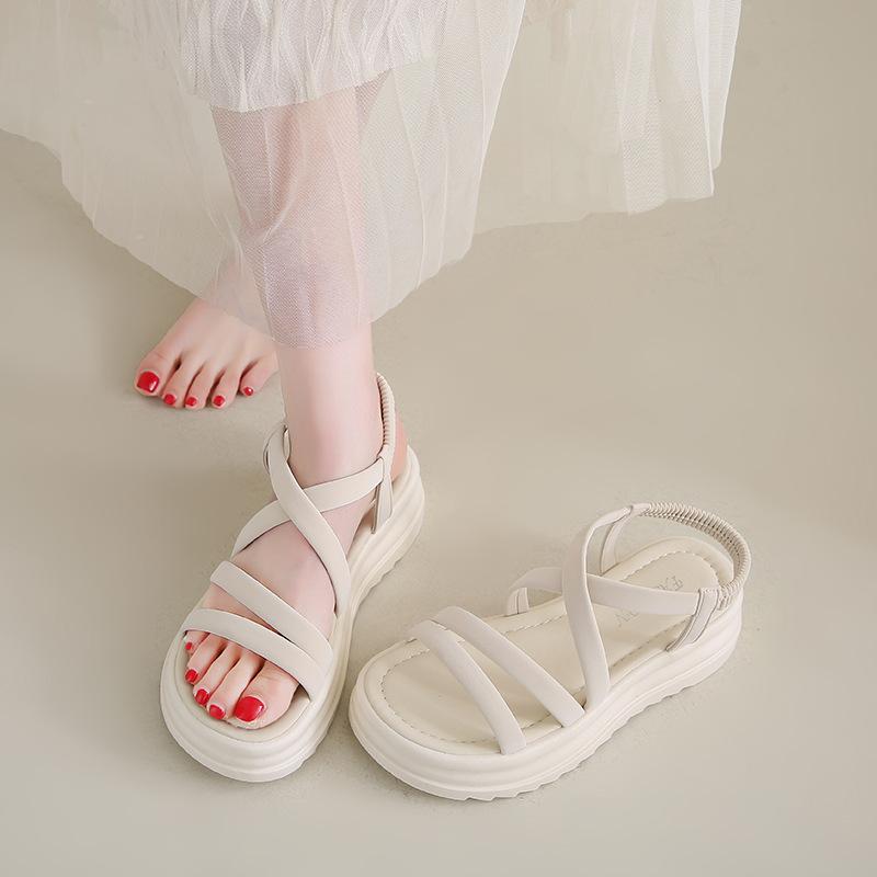 Sandals female 2025 summer new fairy wind round head cross belt casual muffin platform fashion beach roman shoes
