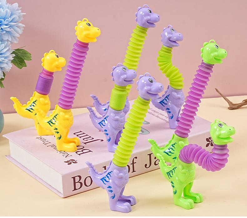 12Pcs Cartoon Stretchable Dinosaur Telescopic Tube Stress Relief Toy for Kids Birthday Party Favors Pinata Fillers Goodie Bag