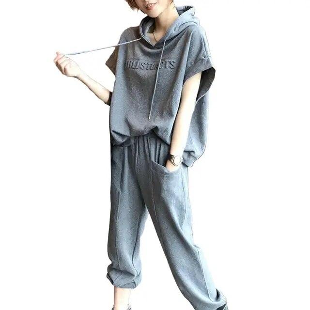 

Женская спортивная одежда, стильная толстовка с капюшоном из 2 предметов, комплект брюк на шнурке, сплошной цвет с короткими рукавами и эластичными карманами на талии для женщин XXL серый