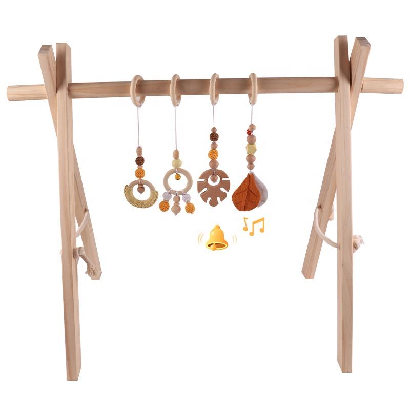 China Manufacturer Exquisite Color Leaf Four-piece Fitness Rack Pendant Wooden Baby Play Activity Gym