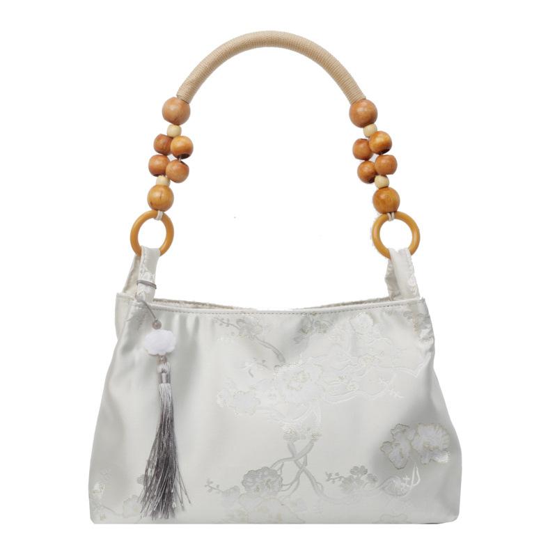 New Chinese niche velvet embossed dark pattern versatile armpit bag, high-end retro foreign style wooden beads, shoulder hand bag