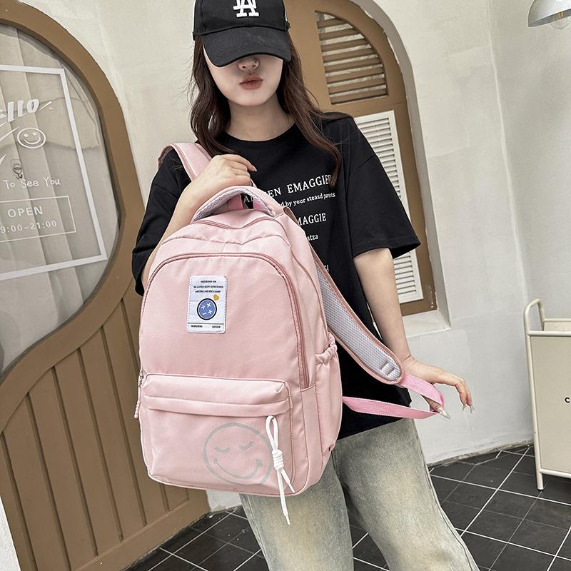 School BagsNew casual backpack, male and female junior high school college student , simple and versatile outdoor travel backpack tide