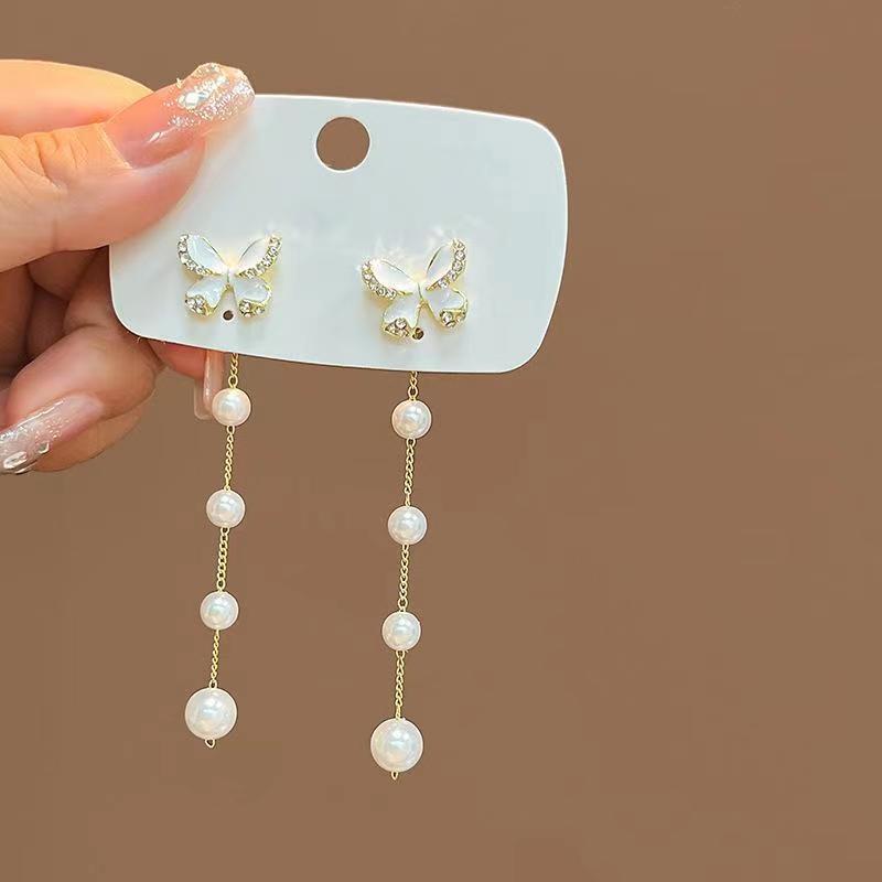 2023 New S925 Sterling Silver Pearl Bow Earrings with Long Tassel & Two-Way Butterfly Design
