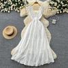 French holiday style v-neck white hollow lace lace dress women's summer high waist and thin temperament long dress