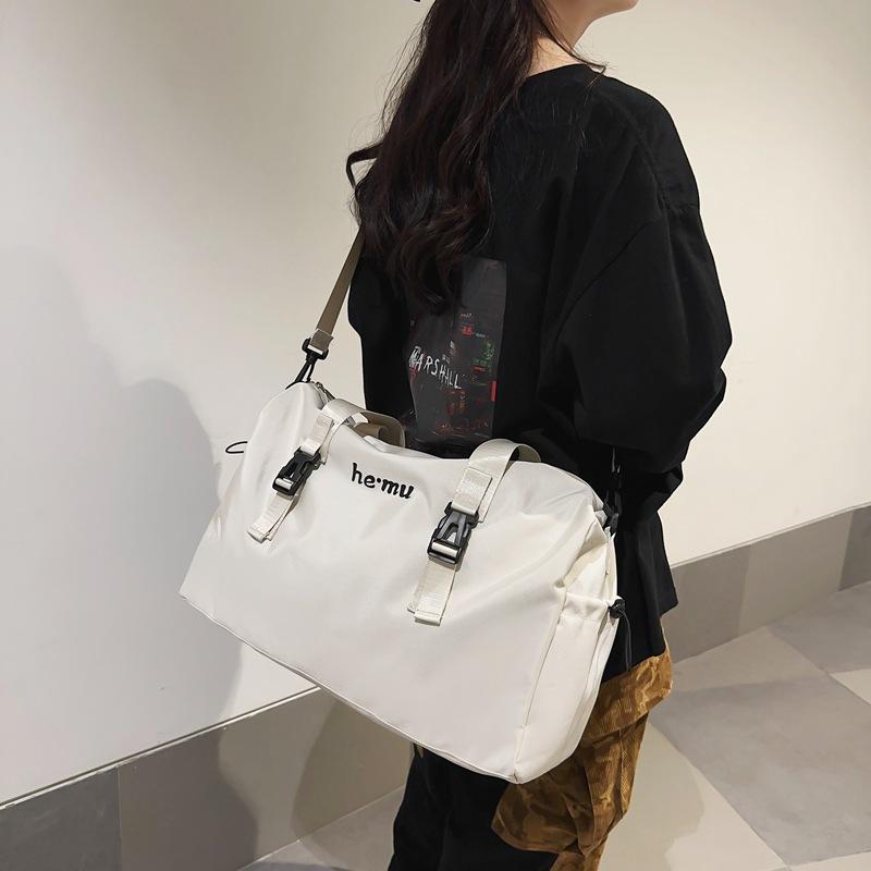 Large-capacity sports fitness bag Couple short-distance portable oblique span travel bag Household storage Hand luggage bag