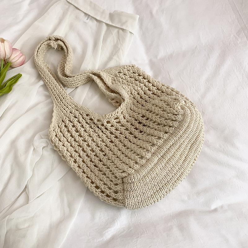 

Leisure large-capacity new hollow lazy literary style shoulder armpit bag vacation beach bag portable women s bag