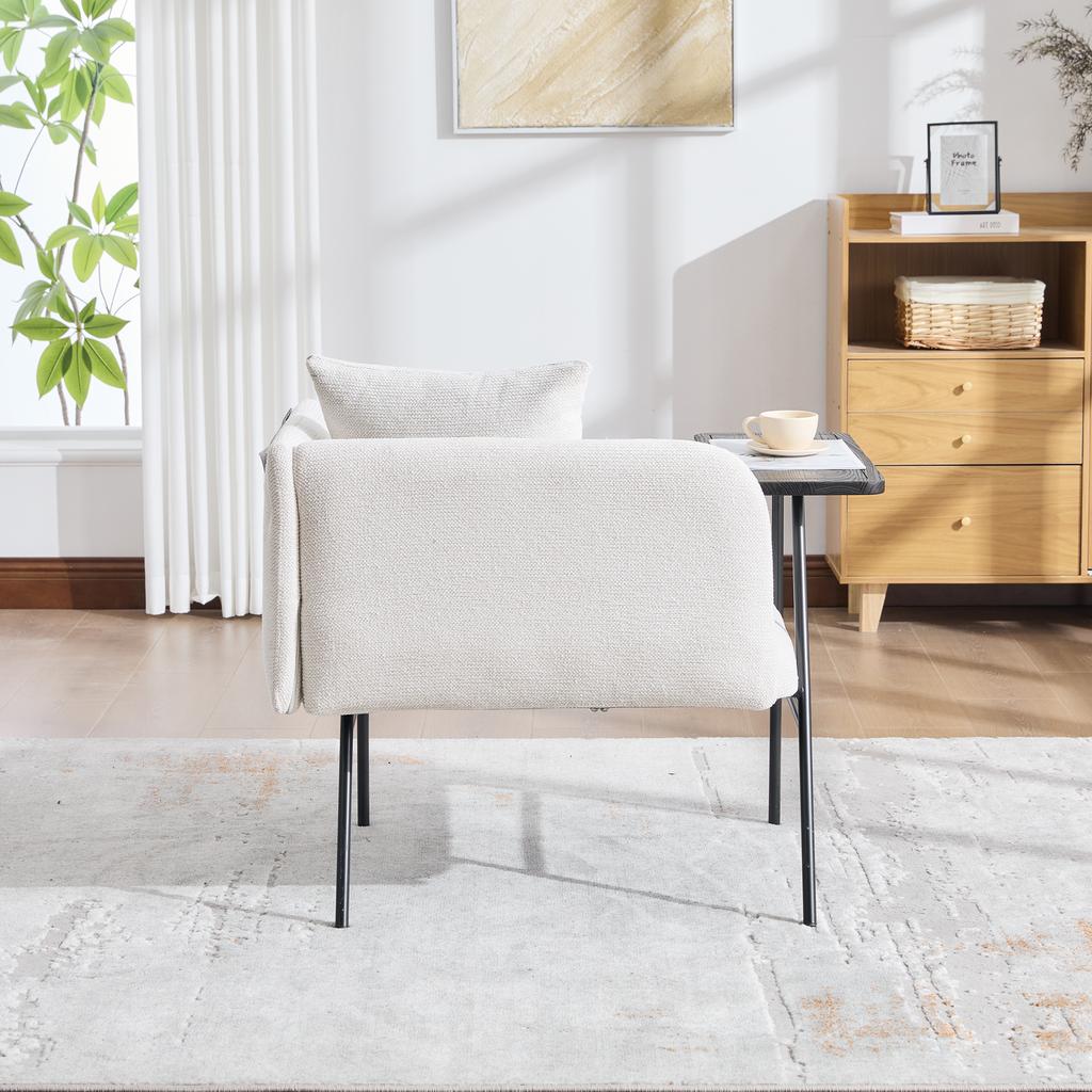 Poltrona individual moderna com encosto de tecido confortável e dois compartimentos de arrumação, complementada por uma mesa lateral prática.