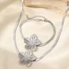 Elegant Vintage Flower Pendant Jewelry Set for Women Stainless Steel Necklace and Bracelet Perfect for Formal Occasions
