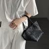 Niche Handmade Woven Dumpling Bag: 2025 High-End Drawstring Handbag & Mother-Child Market Bag
