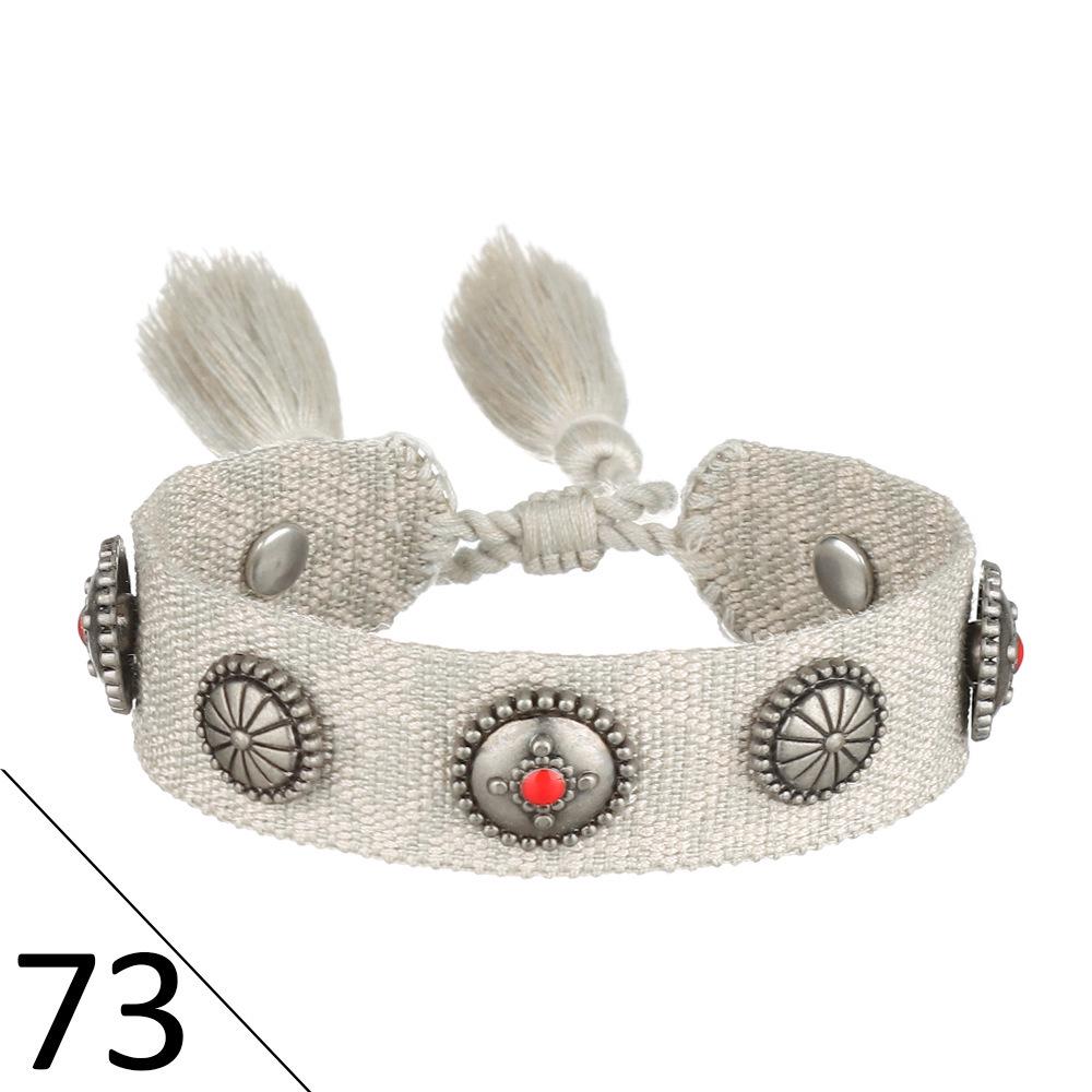 European Woven Bracelet with Metal Nail Buckle and Tassel for Women