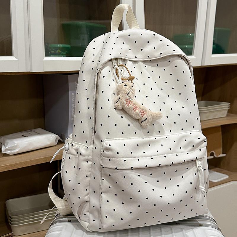 Korean version of polka dot schoolbag female college student simple cute girl backpack junior high school girl small fresh backpack tide