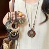 Bohemian wood beads beaded hollow round pendant necklace light luxury high-end sweater chain niche necklace accessories