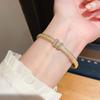 Luxury Gold And Silver Oval Hand Chain With Gemstone Detailing For Daily Fashion
