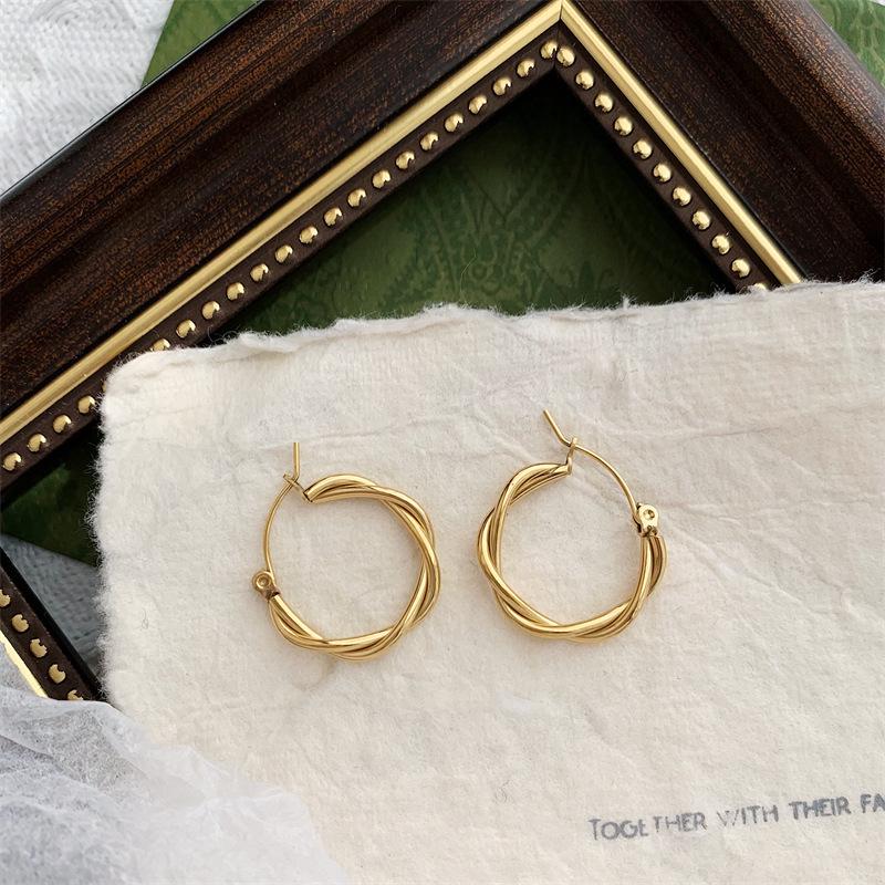 French Retro Gold-Plated Twisted Hoop Earrings - Titanium Steel Studs for Women, European-American Fashion.