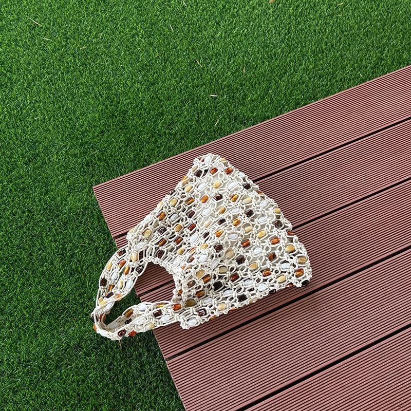 

Versatile summer woven hollow contrasting color beaded design portable shoulder bag underarm bag