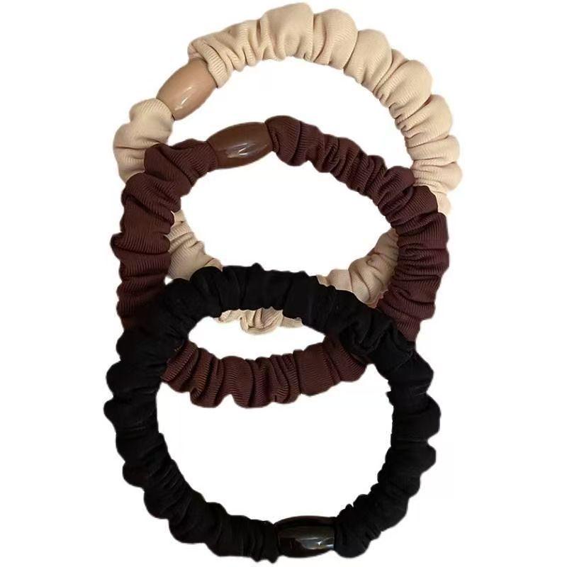 Versatile Black Elastic Hair Tie with Durable Leather Case