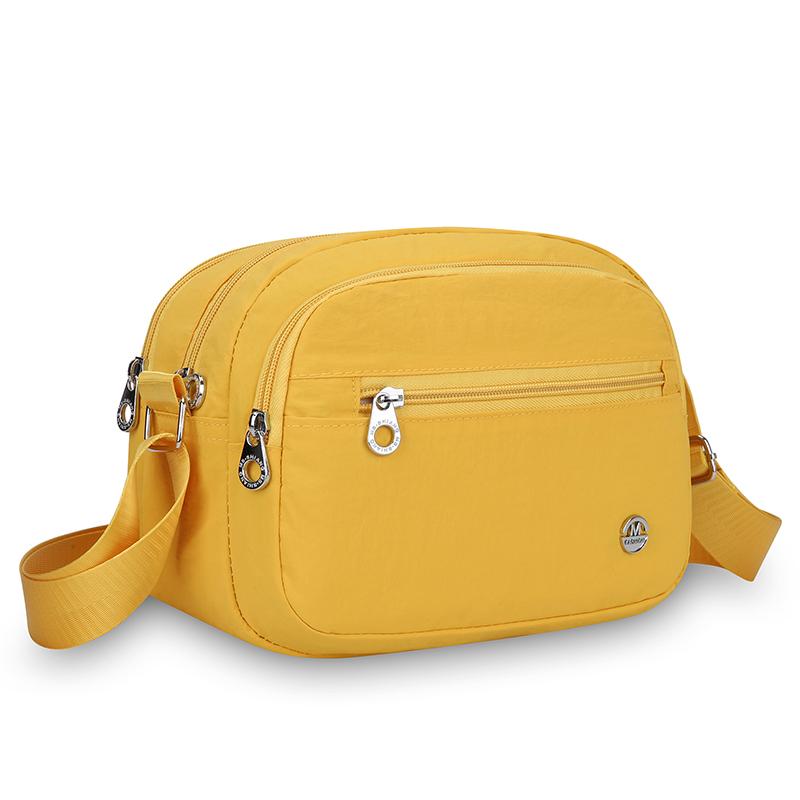 

Women s Lightweight Nylon Crossbody Bag – Spacious Organizer with Laptop Sleeve, Modern Minimalist City Bag жовтий