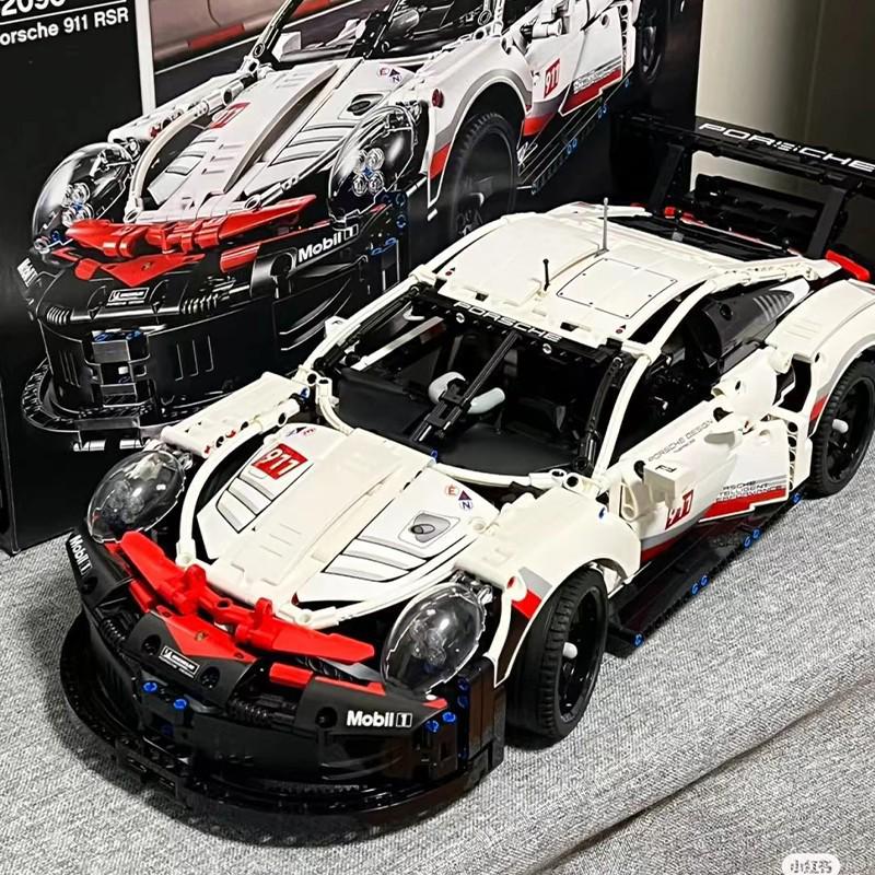 

Совместимые с Lego Строительные блоки Porsche 911 RSR - Модель гоночного спортивного автомобиля с дистанционным управлением для мальчиков, познавательная и увлекательная!
