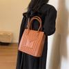 Einzug frisch und süß Mode einfarbig lässig 2025 Winterdesign lässige Schulter tragbar kleine quadratische Damenhandtasche