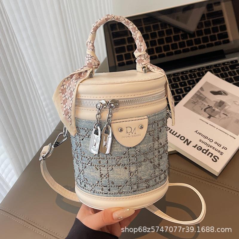 Niche simple high-end cylinder bag 2025 new temperament versatile shoulder messenger handbag foreign style bucket bag tide