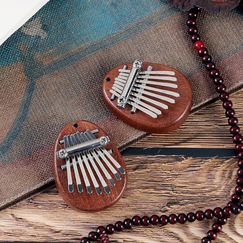 Bærbar Mini Sapele-plate med 8 nøkler Kalimba Nybegynnere Tommel Piano Gave