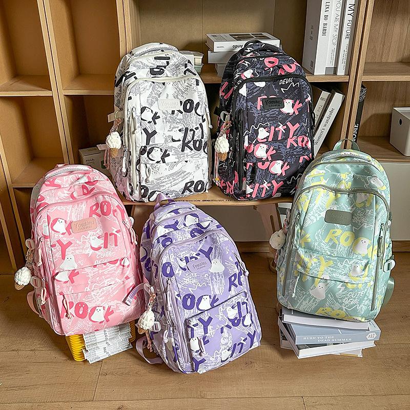 Backpack female junior high school college students high value new large capacity graffiti design sense backpack female