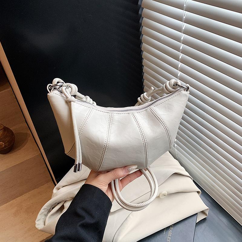 

Нишевая сумка женская весна-лето 2025 новая модная на одно плечо кроссбоди сумка-круассан высококлассная подмышечная сумка-пельмень