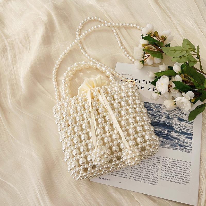Spring beaded retro fashion sweet pearl hand strap personality trend shoulder personality messenger women's bag
