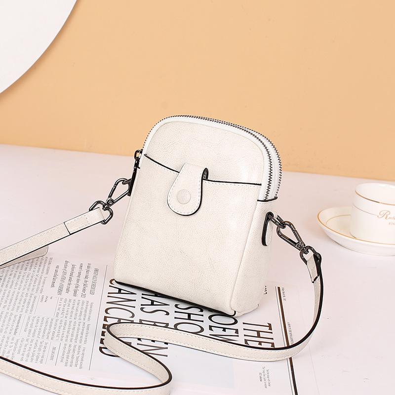 

Сумка для телефона из натуральной кожи Женская сумка 2025 Новая трендовая Летняя Горячая мода Универсальная Мини из коровьей кожи На плечо Через плечо Маленькая жемчужина белый