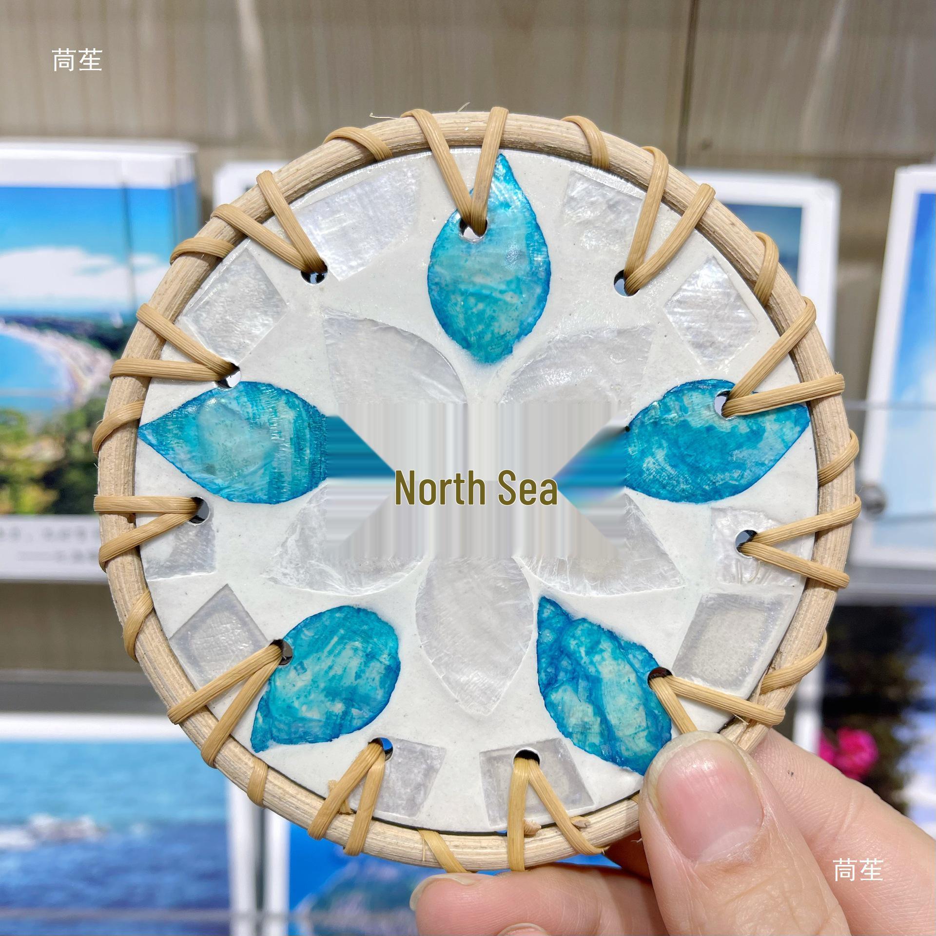 

Guangxi Beihai Rattan Shell Magnet: Handmade Blue & Yellow Fruit Souvenir Gift. Blue Yellow Fruit