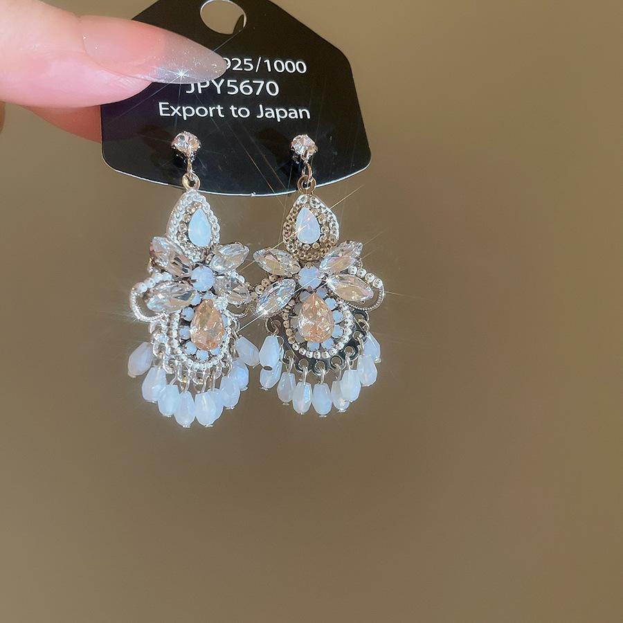 Europäischer und amerikanischer ethnischer Stil, mit Diamanten besetzte Wassertropfen-Quasten-Ohrringe, Steckerohrringe, Damenohrringe, Design-Sinn Nische