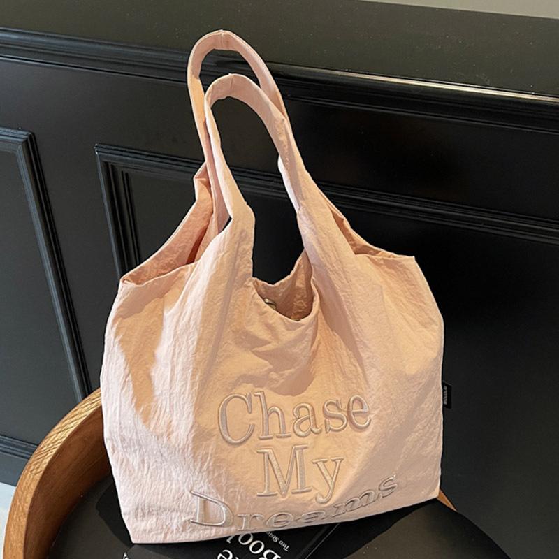 Casual lazy wind large capacity armpit bag women's summer new letter embroidered tote canvas bag