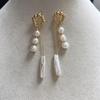 Baroque natural freshwater pearl earrings feature a niche female aura and a distinctive design, with an irregular fashion and exaggerated pendant
