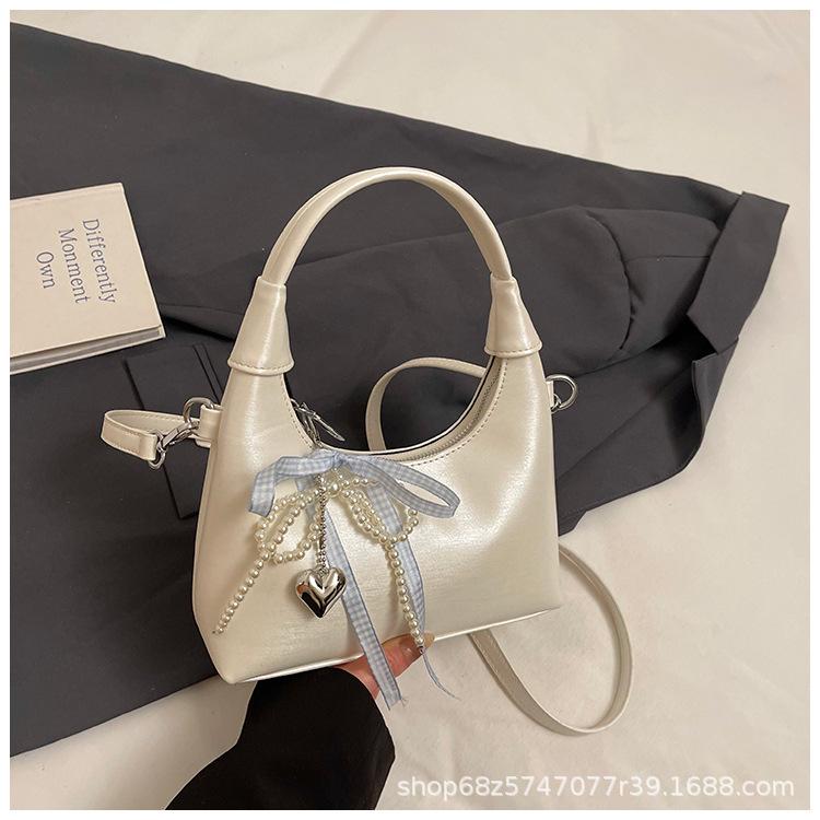 

Foreign style bow hand bag women s 2025 new Korean version ins messenger bag fashionable commuter shoulder bag белый
