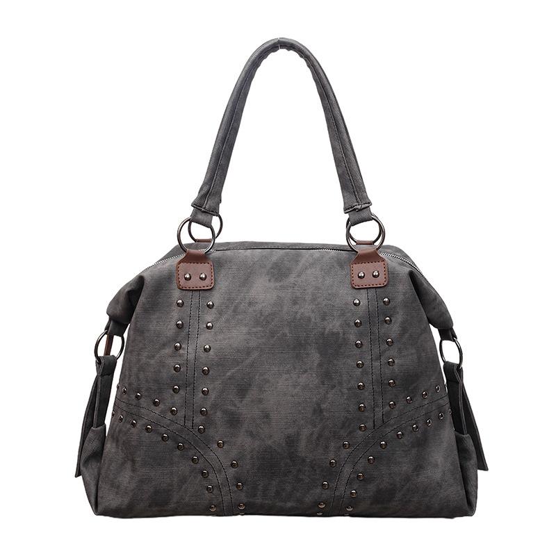 

2025 autumn new fashion rivet shoulder bag large capacity tote bag women s high value casual commuter armpit bag чёрный