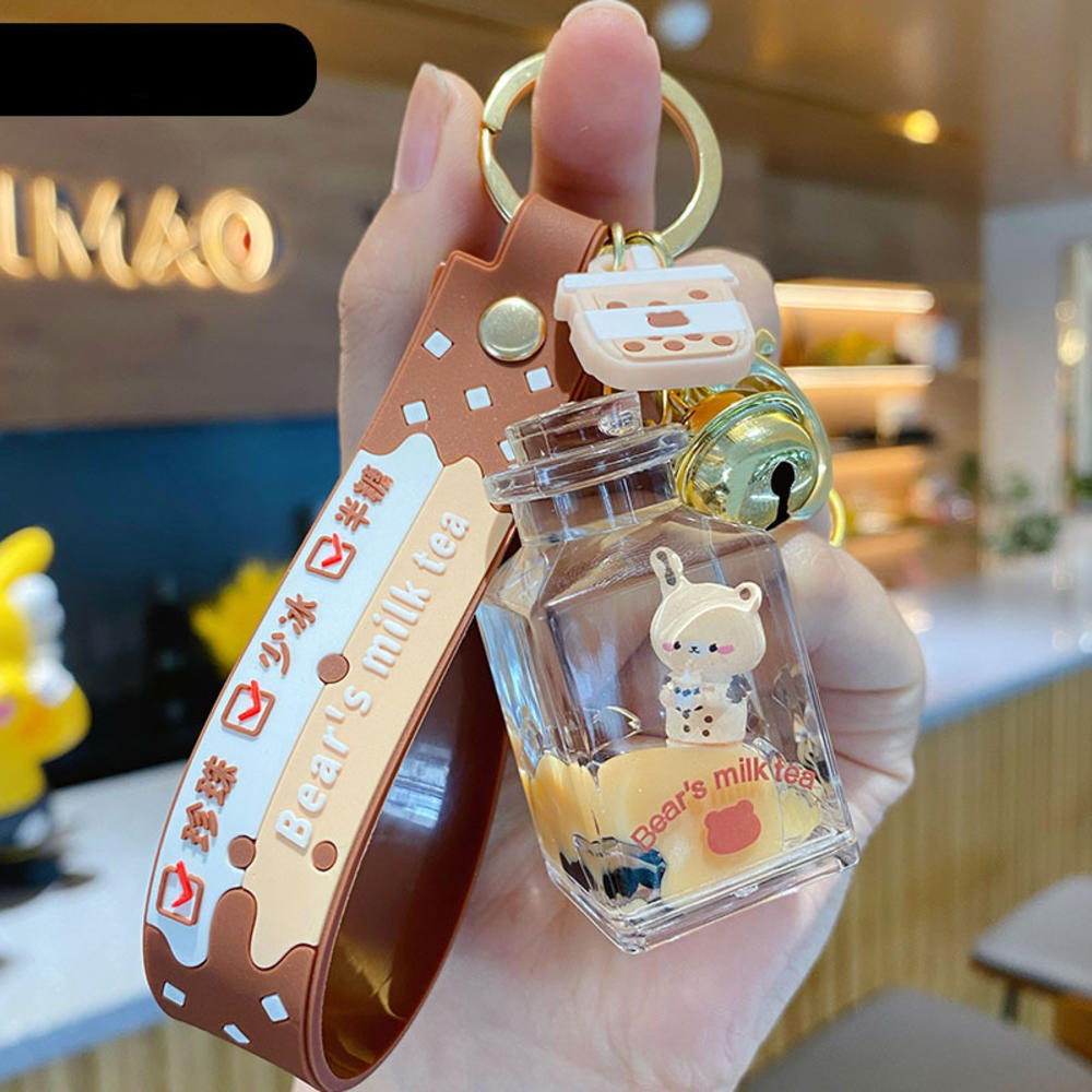 Cartoon oil floating liquid quicksand bottle pearl milk tea bear key chain cute trendy car key chain pendant Key Ring