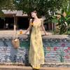 2026 Summer New Hip-wrapped Fishtail Dress Yellow Floral V-neck French Printing Temperament Slim-fitting and Thin Dress
