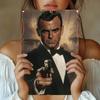 VintageInspired Metal Tin Sign Rust WeatherProof Featuring a Dramatic Portrait with Gun for Home Living Roo